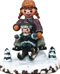 Hubrig Volkskunst Neuheiten*Miniatur Winterkind Schlittenfahrerin, 7 cm, von